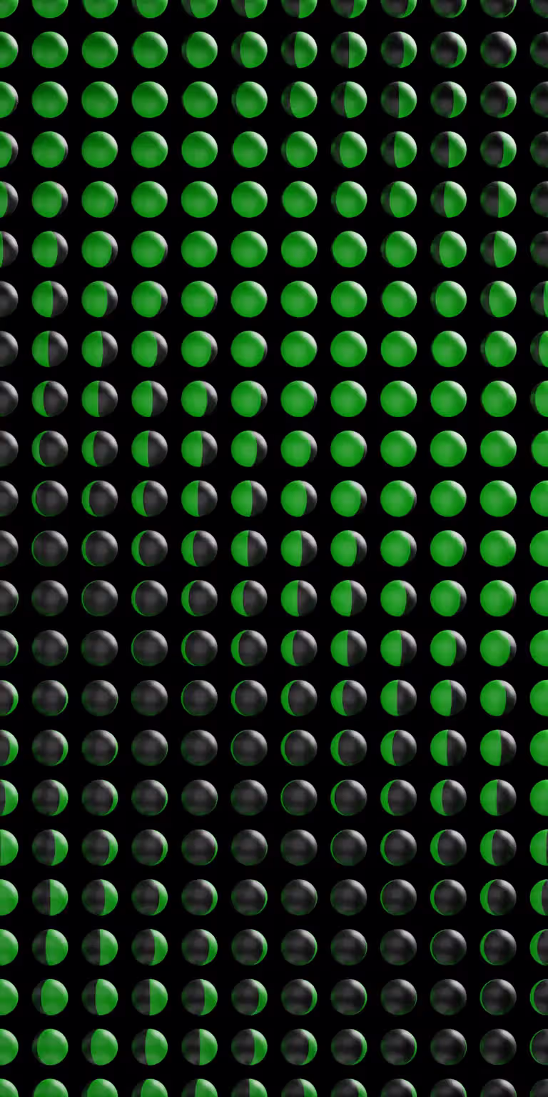 Black-and-green balls form a shifting pattern.