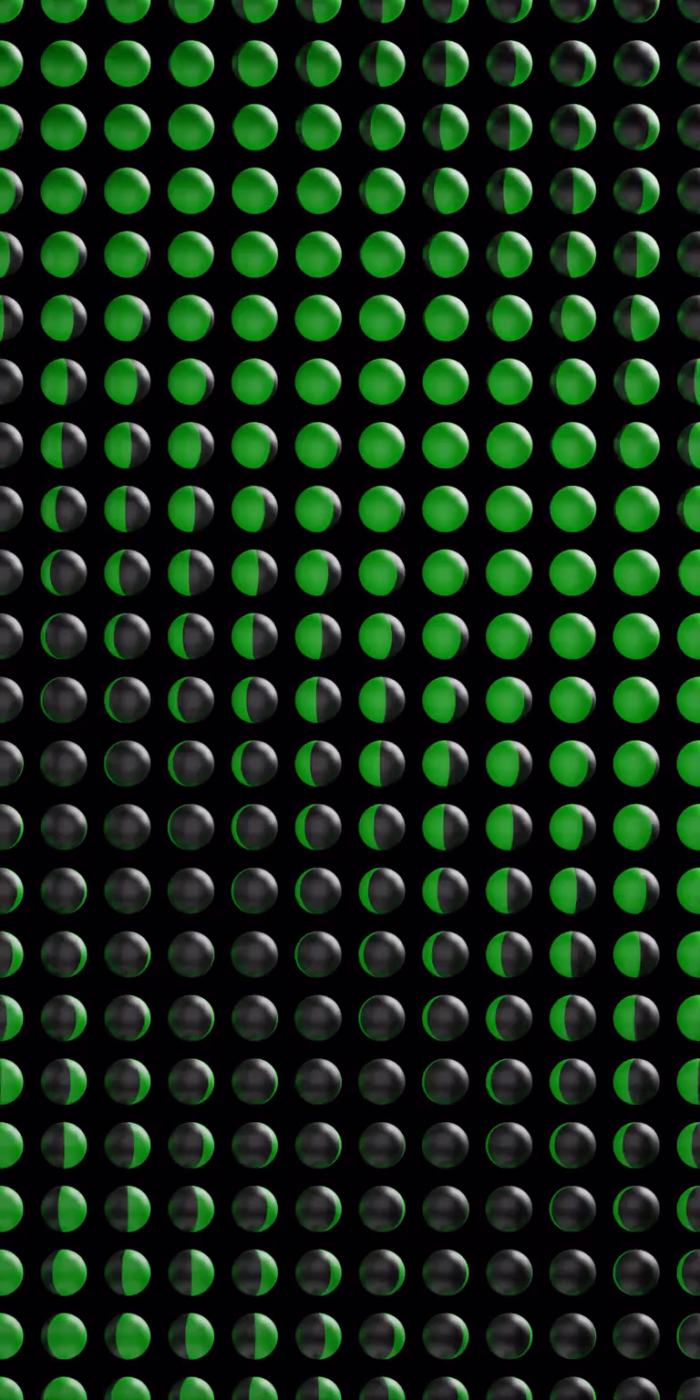 Black-and-green balls form a shifting pattern.