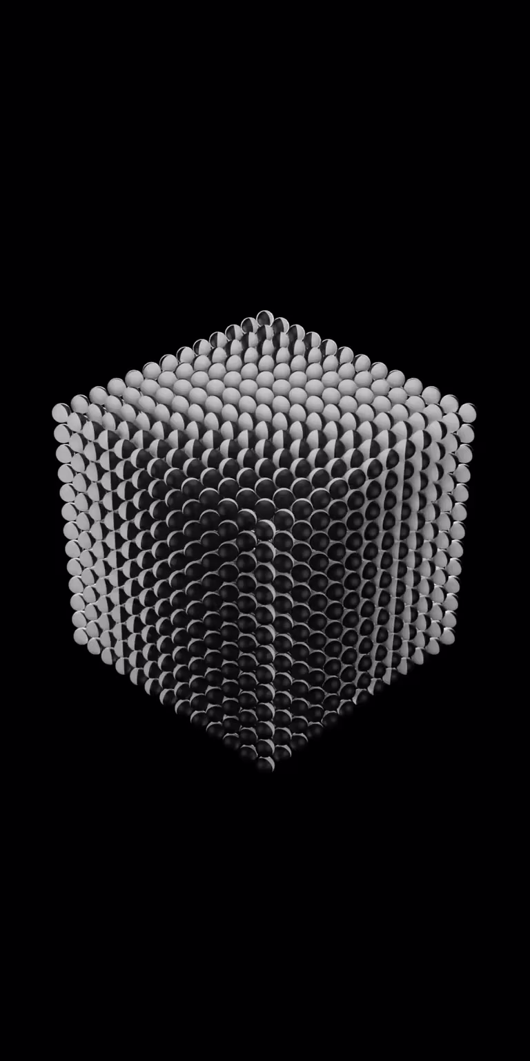 A cube made of rotating black-and-white balls continuously changes shape.