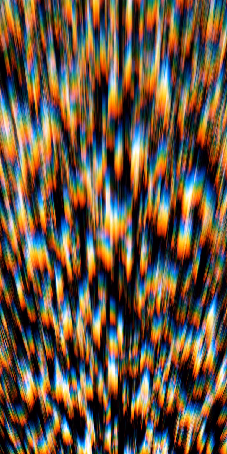 Flowing distortions bend and shift the colors.