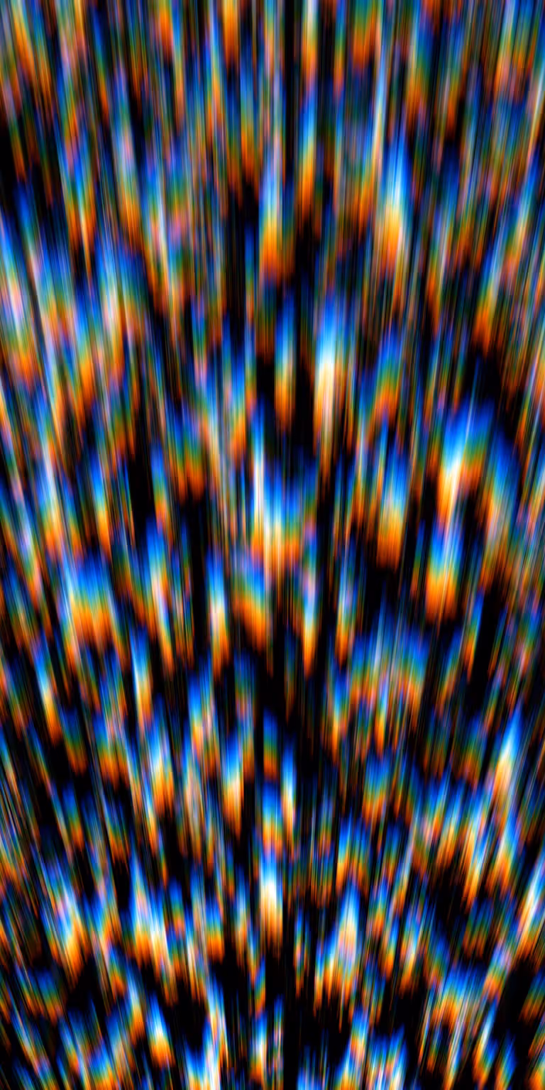 Flowing distortions bend and shift the colors.
