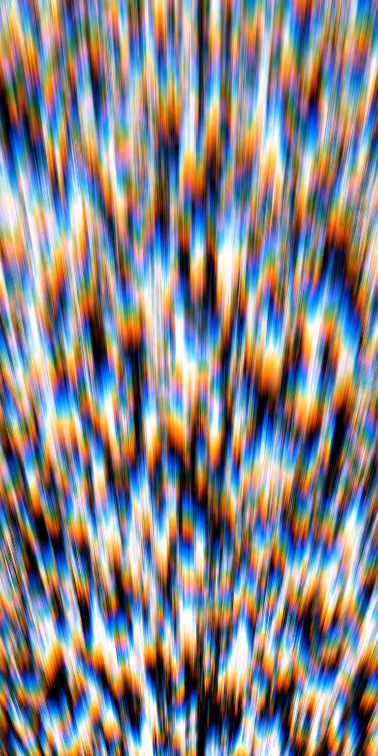 Flowing distortions bend and shift the colors.