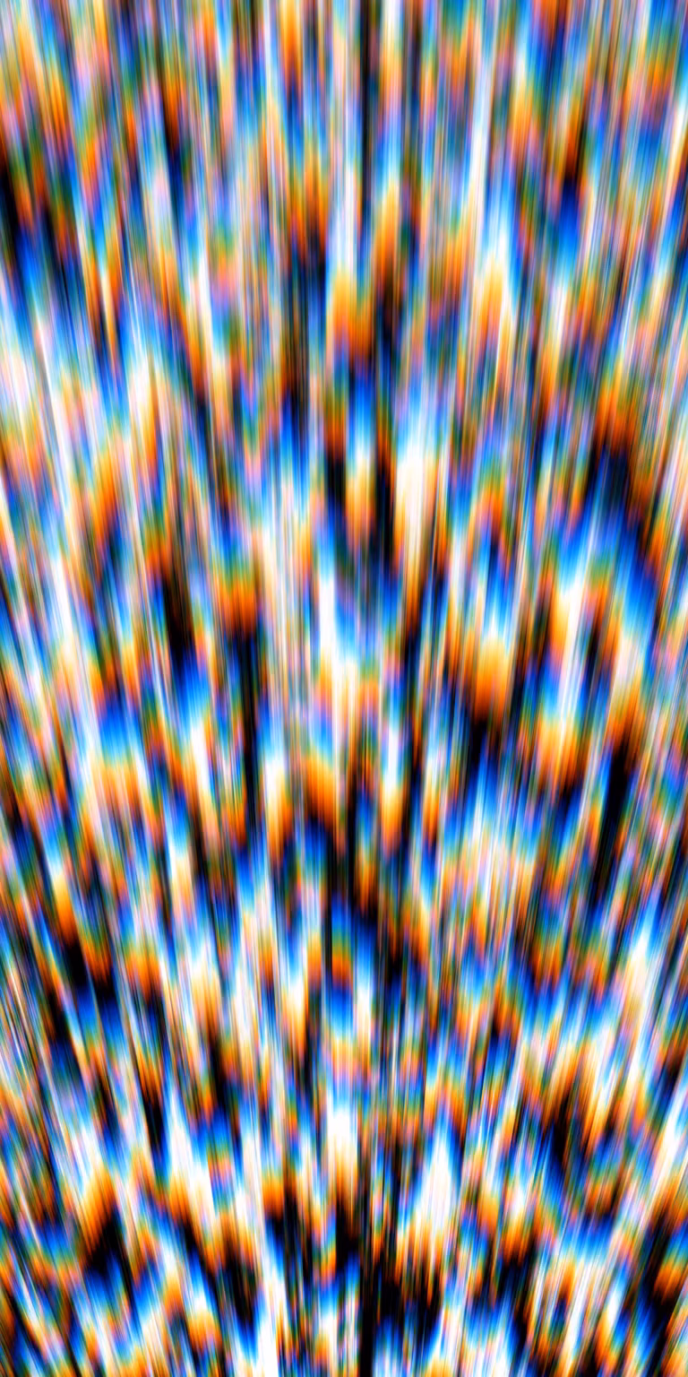 Flowing distortions bend and shift the colors.