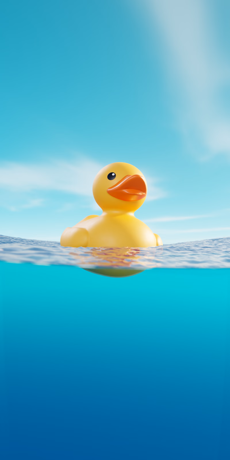 A yellow rubber duck bobs at the waterline beneath a pale blue sky.
