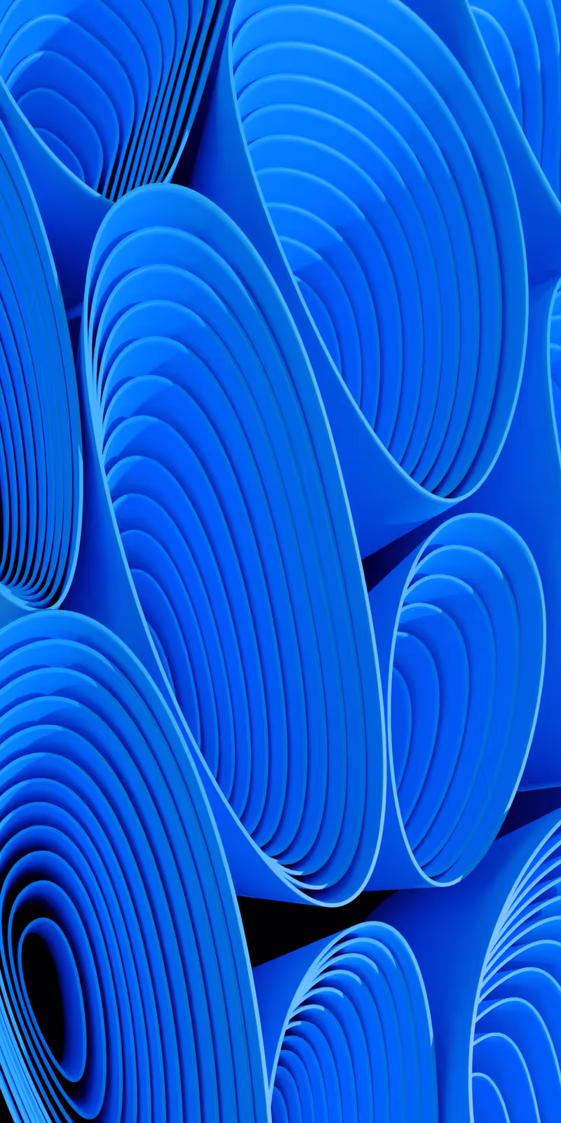 Abstract blue shapes flow and transform.