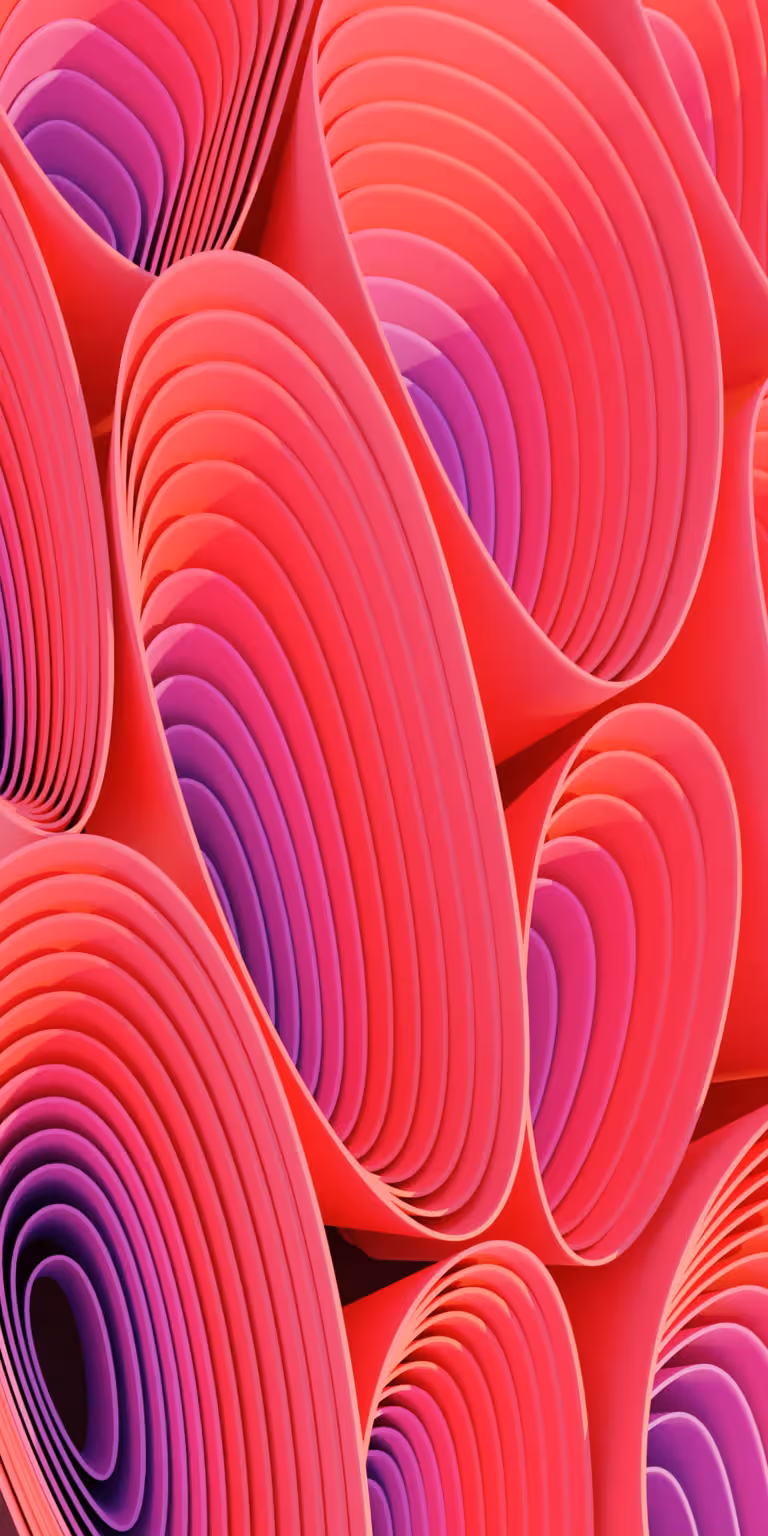 Abstract pink shapes flow and transform.