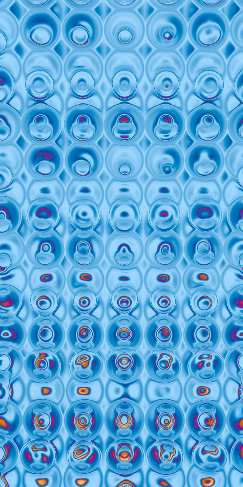 Tiny ice-blue circles ripple like frozen liquid.