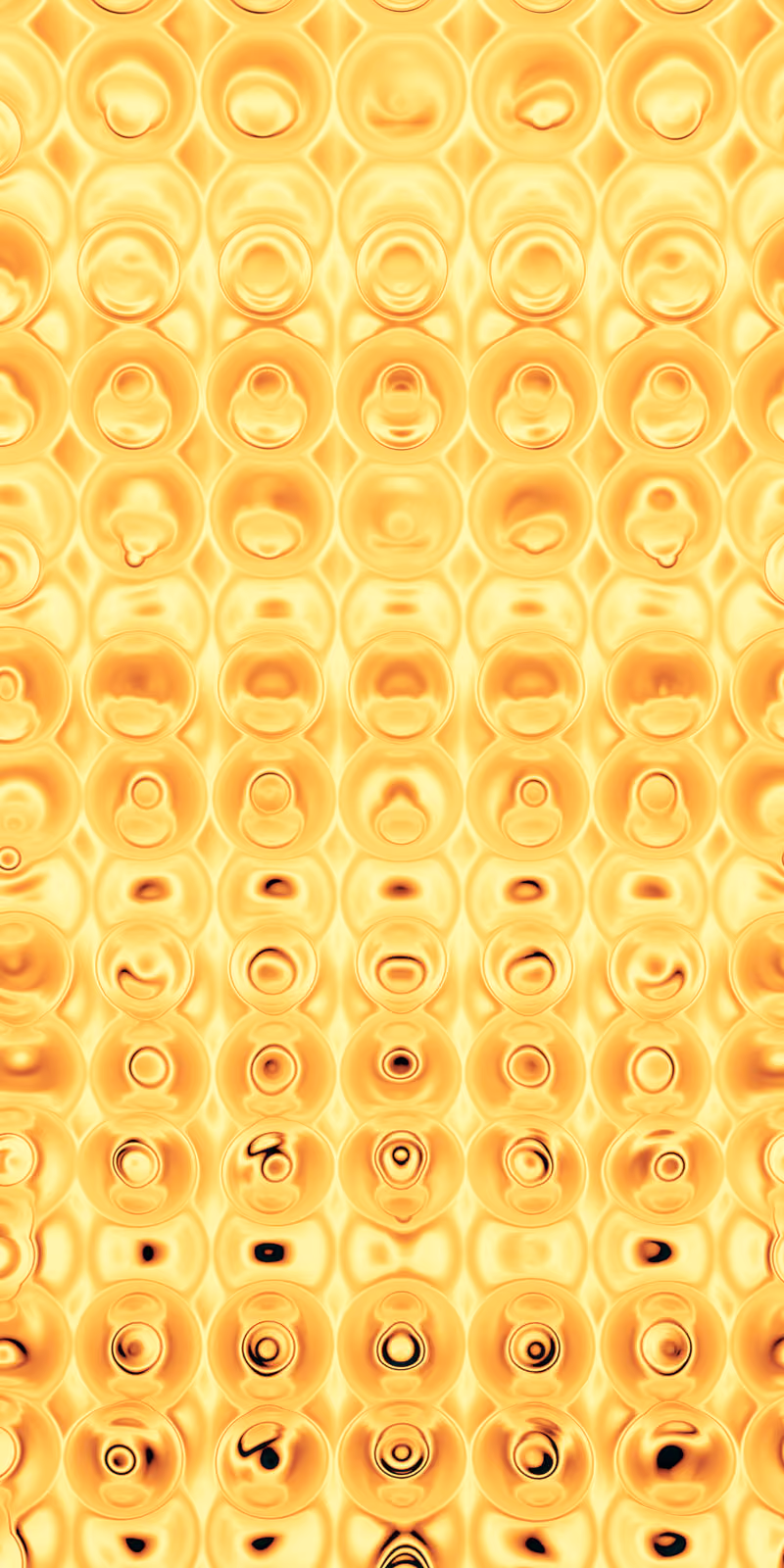 Tiny golden circles shimmer like molten metal.