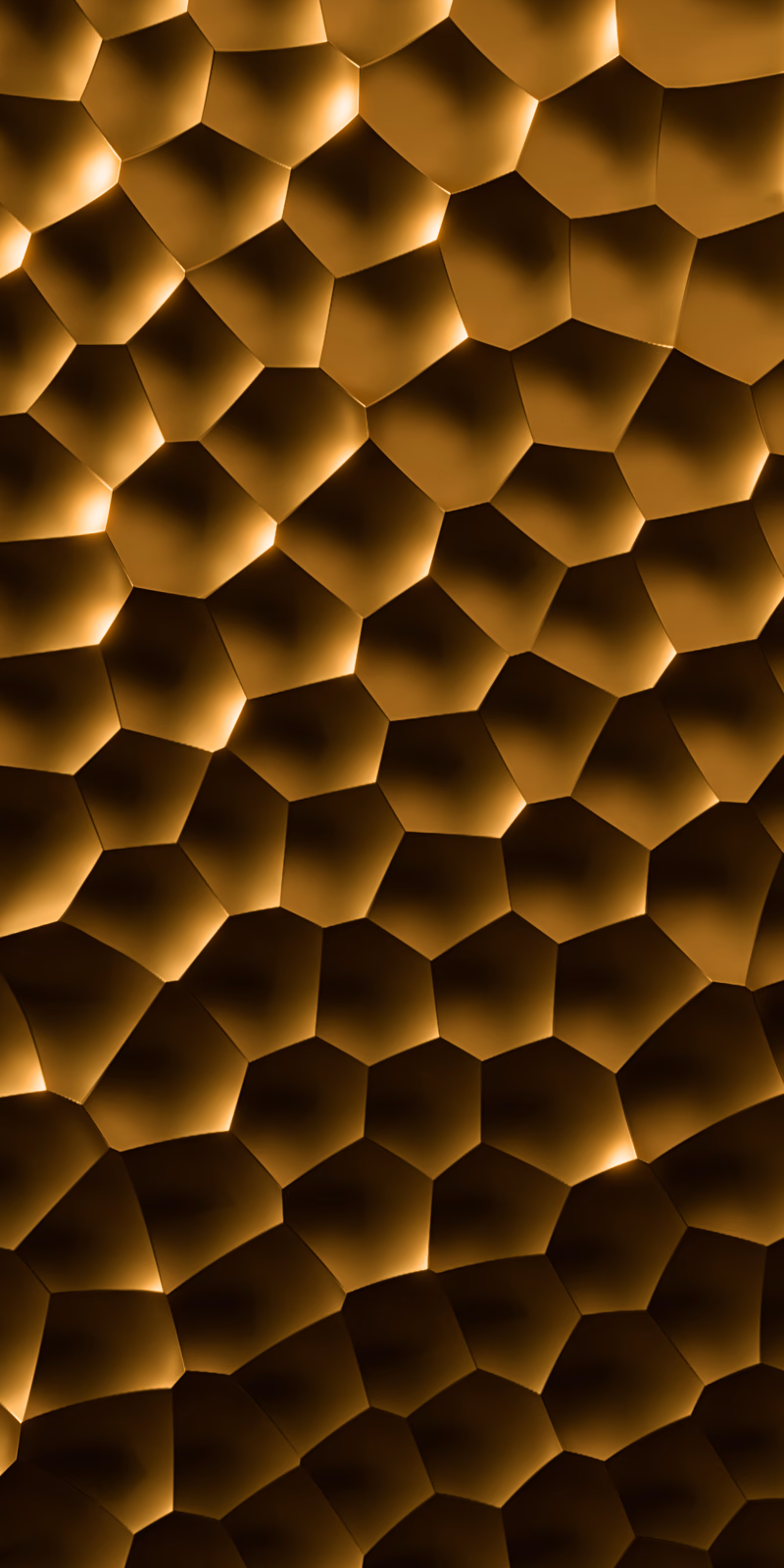 Golden geometric forms shift in an abstract relief.