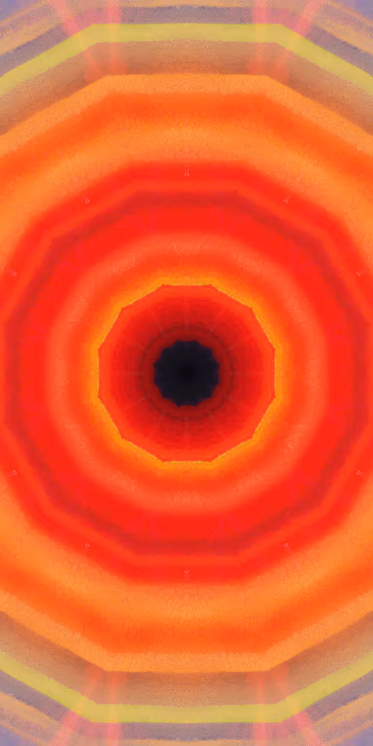 Red, orange and yellow colors glitter in the kaleidoscope.