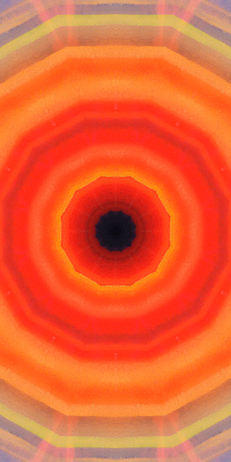 Red, orange and yellow colors glitter in the kaleidoscope.