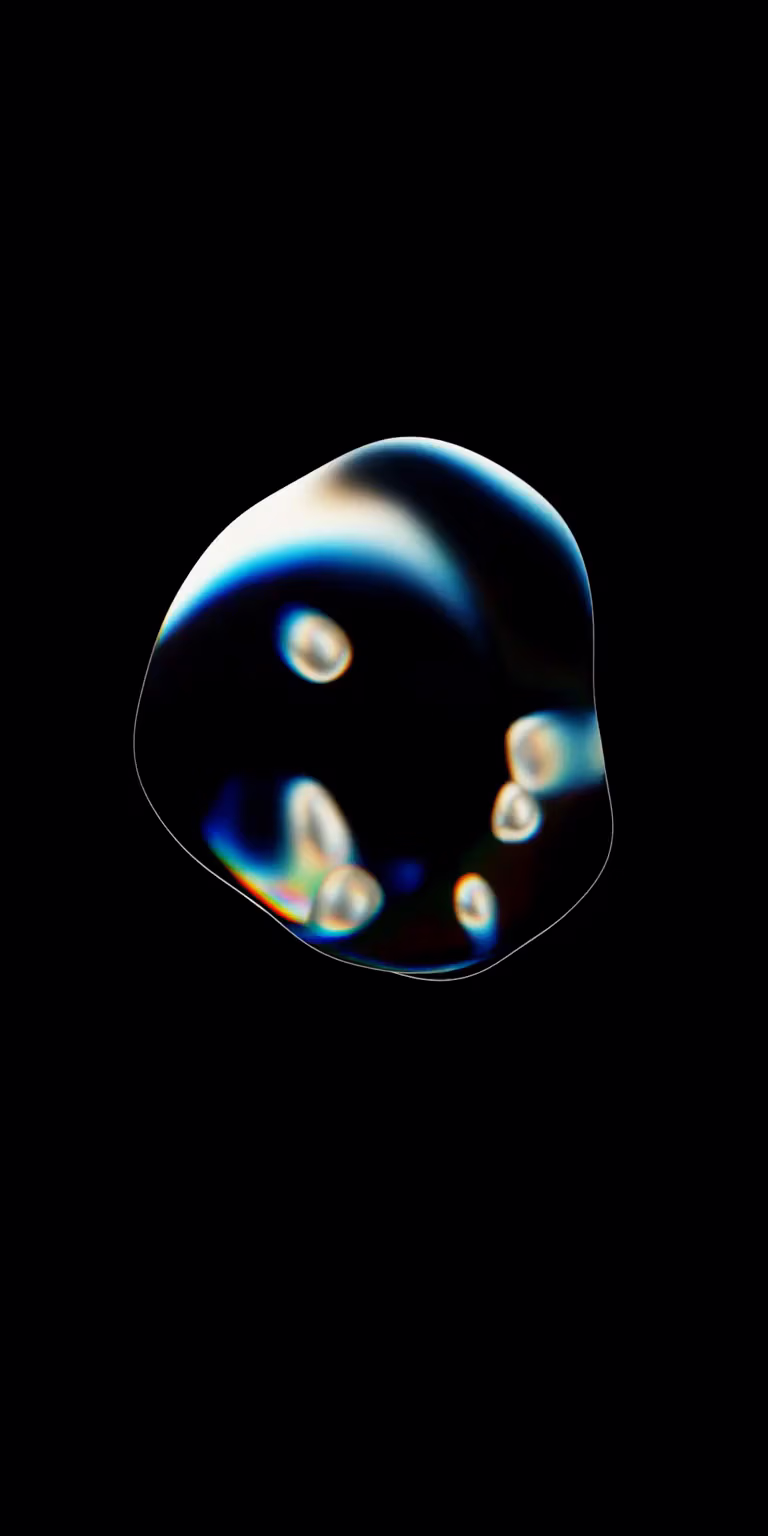 A translucent liquid bubble flows and changes shape.
