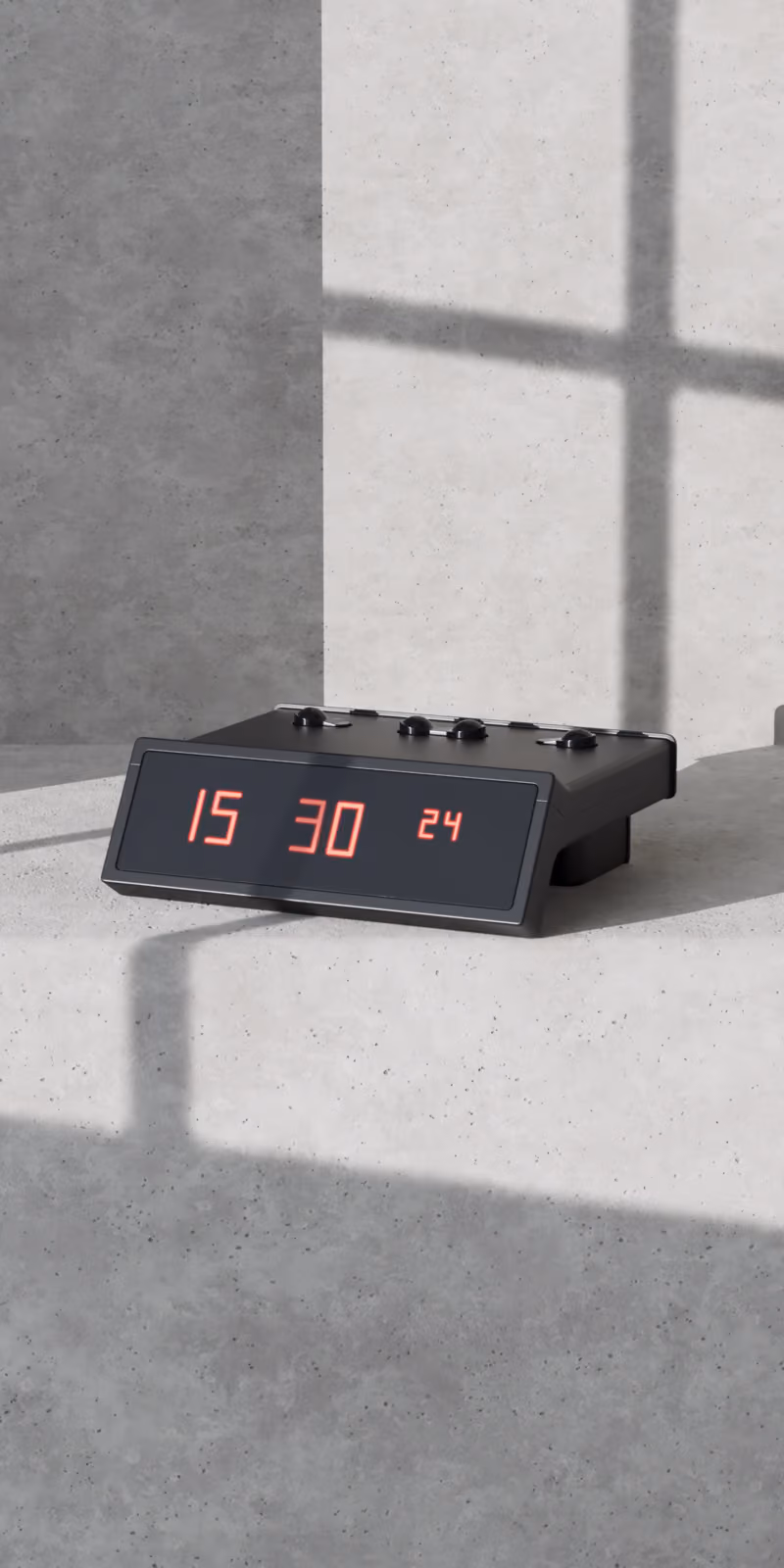 A red LED clock glows on a concrete pedestal.